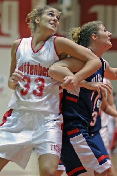 Kathy Hittle battles for a rebound.